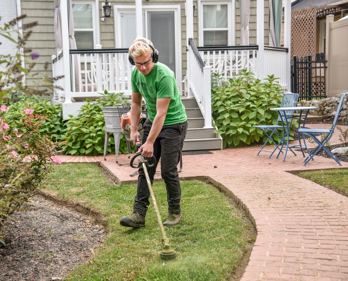 Professionally landscaped front yard with curved planting beds